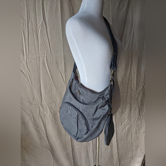 Travelon Anti-Theft Crossbody Bucket Bag - Picture 3 of 12